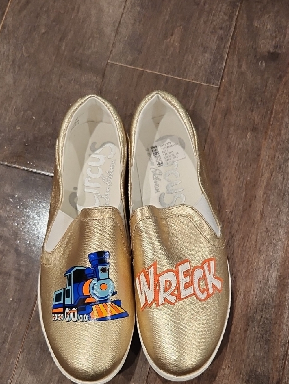 Circus by Sam Edelman Gold Slip-On Shoes with Blue Train and Orange 'WRECK'